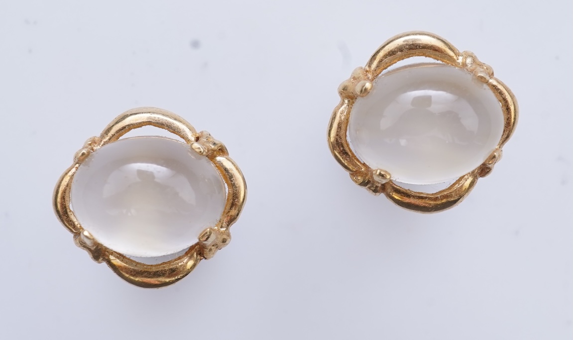 Eight pairs of earrings and pendant, comprising: a pair of onyx studs; a pair of emerald studs; a pair of sapphire and diamond drop earrings; a pair of opal drop earrings; a pair of garnet drop earrings; and a shell pend
